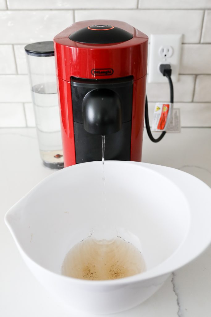 murky water coming from nespresso machine