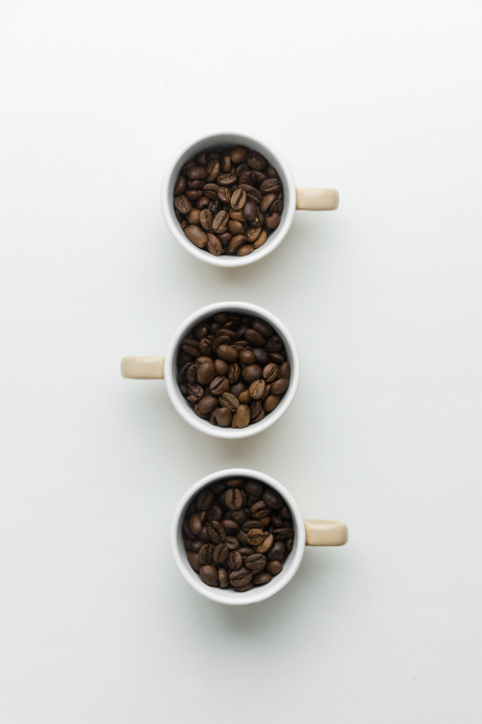 3 cups with coffee beans