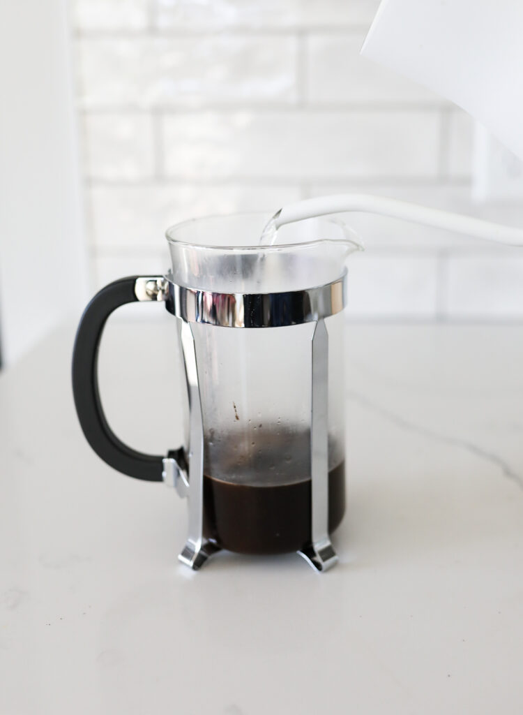 pouring hot water into french press