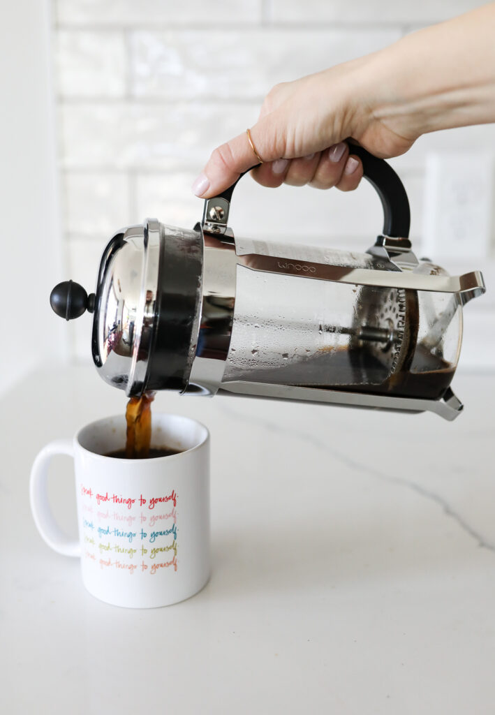 pouring a cup of coffee from french press