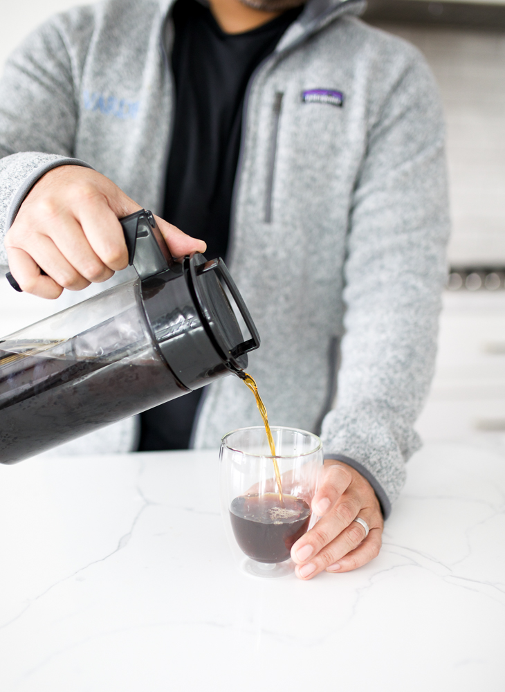 finished cold brew pouring into a cup