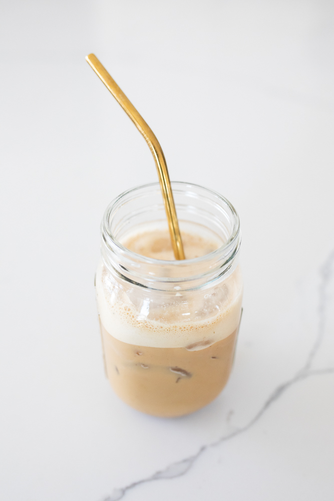 shaken espresso drink in mason jar