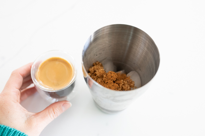 adding espresso to shaker