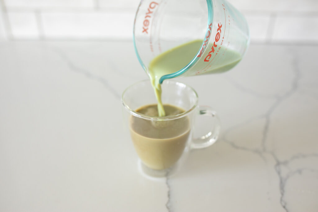 pouring matcha tea into espresso